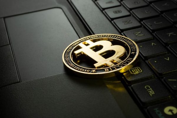 Cryptocurrency - silver and black round emblem
