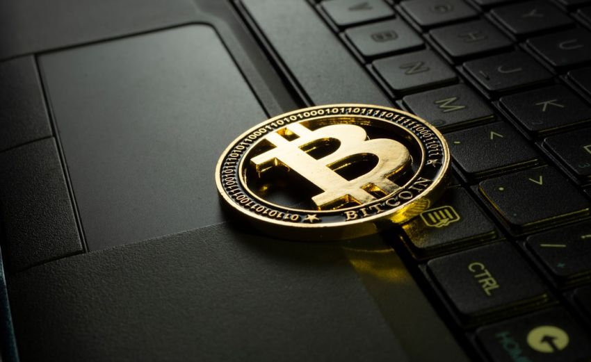 Cryptocurrency - silver and black round emblem