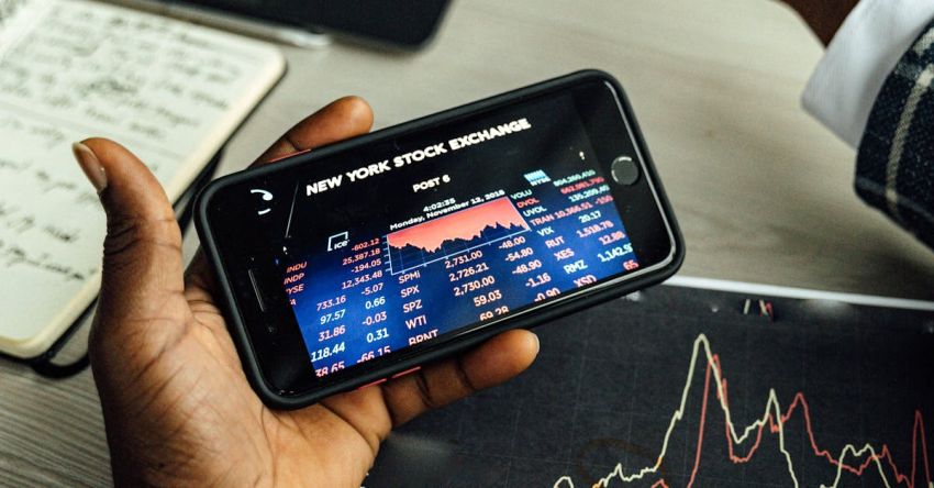 Stock Trading - A Person using a Smartphone