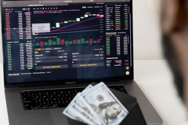 Stock Trading - Photo Of Man In Front Of Laptop