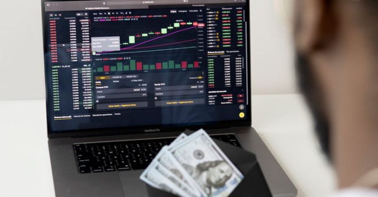 Stock Trading - Photo Of Man In Front Of Laptop