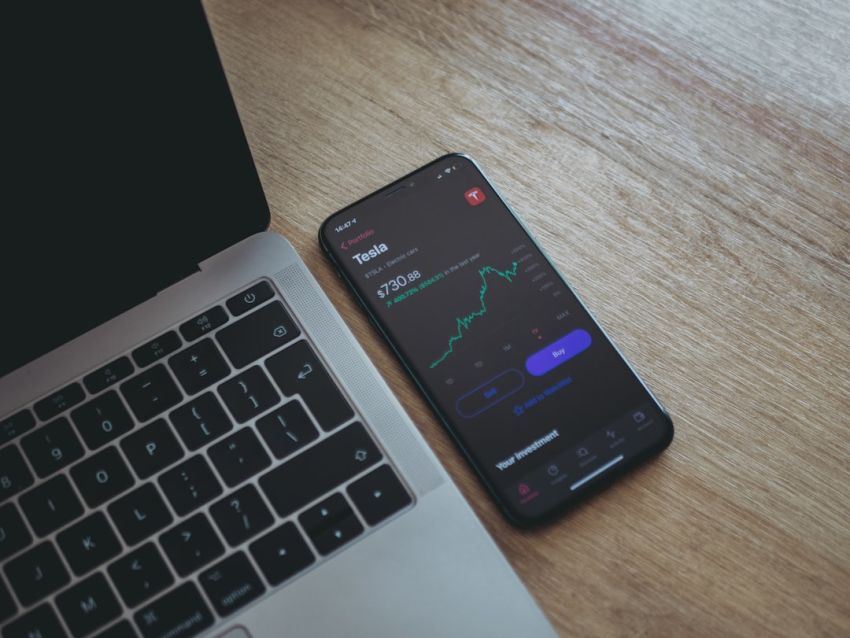 Stock Trading - black android smartphone on macbook pro