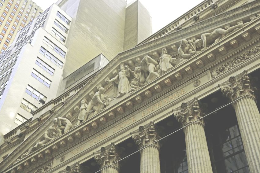 Stock Trading - low angle photography of concrete building