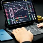 Cryptocurrency - person using black and gray laptop computer