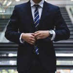 Investment - person standing near the stairs