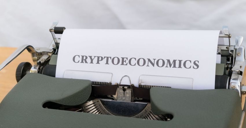 Valuations - A typewriter with a paper that says cryptonomics