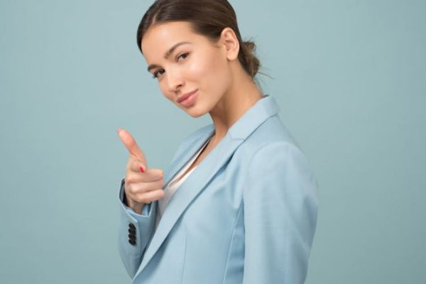 Confidence - Woman Wearing Blue Shawl Lapel Suit Jacket