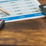 Rates - A Close-Up Shot of an Agent Pointing Rates with a Ballpen