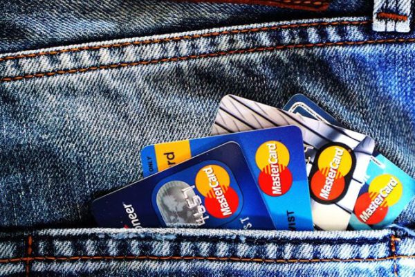 Credit Score - Blue Master Card on Denim Pocket