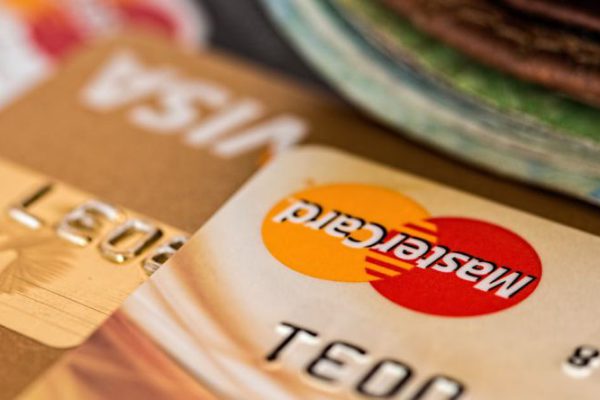Banks - Close-up Photography Two Brown Cards