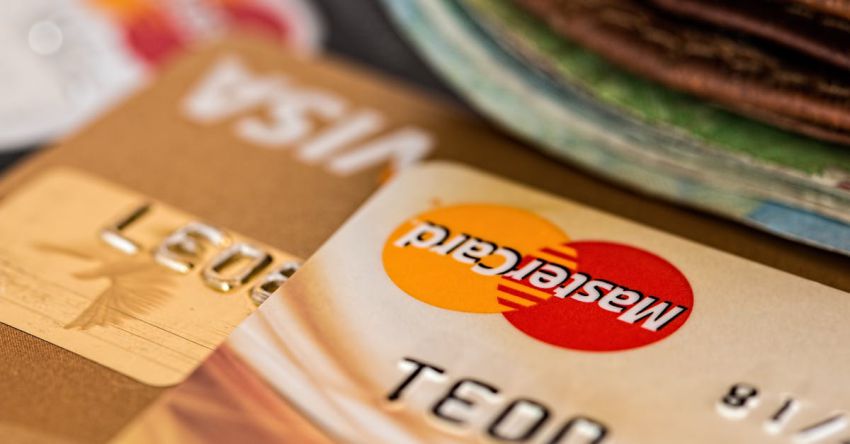 Banks - Close-up Photography Two Brown Cards