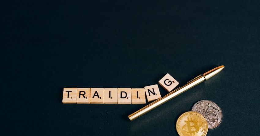 Cryptocurrencies - Traiding Sign by Pen and Coins