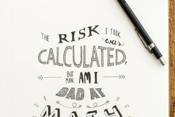 Risk - Flat Lay Photography of Notebook, Pen, and Drafting Compass