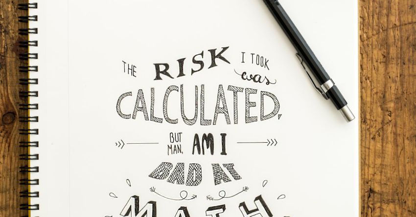 Risk - Flat Lay Photography of Notebook, Pen, and Drafting Compass